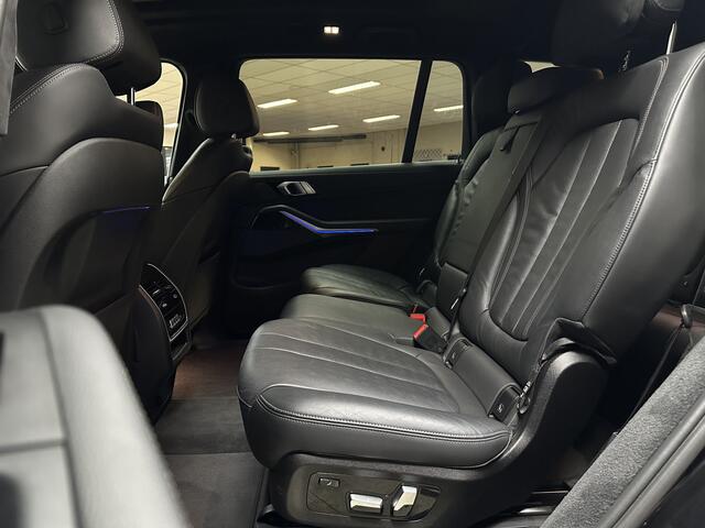 BMW X7 M50d High Executive/ 400pk/ Automaat/ Trekhaak/ Panorama-Dak/ Harman-Kardon/ Virtual Dashb./ 22'' LMV/ Luchtvering/ Memory/ Zwarte-Hemel/ 360°Camera/ Shadowline/ Ambient light/ Stoelverw./ Keyless/ Leder.