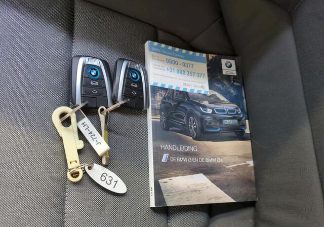 BMW i3 Basis 120Ah 42 kWh 1e-Eig, Keurig-Onderh, 12-Mnd-BOVAG, NL-Auto, Warmtepomp, Cruisecontrol, Keyless-Start, Parkeersensoren, Navigatie, Airco, Bluetooth, Stoelverwarming, Licht-Zicht-Pakket, Lm-Velgen-19Inch, Privacy-Glas