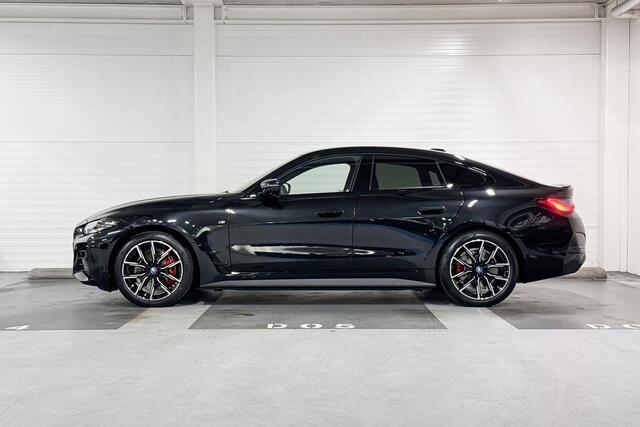 BMW i4 eDrive40 | M-Sport Pro | High Executive | Schuif-/kanteldak | Comfort Access | Trekhaak