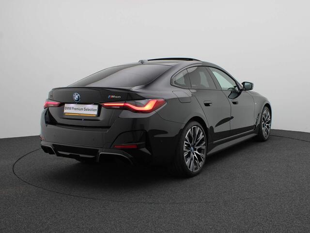 BMW i4 M50 84 kWh High Executive M Sportpakket / Schuifdak / Harman Kardon / Laserlight / Active Cruise Control / 21''