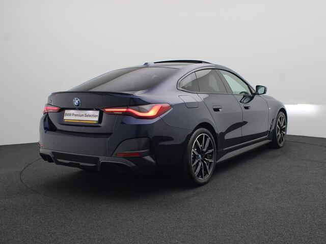 BMW i4 eDrive35 High Executive | M Sportpakket Pro | Safety Pack | Schuifdak | Active Cruise Control | Harman Kardon | 19''