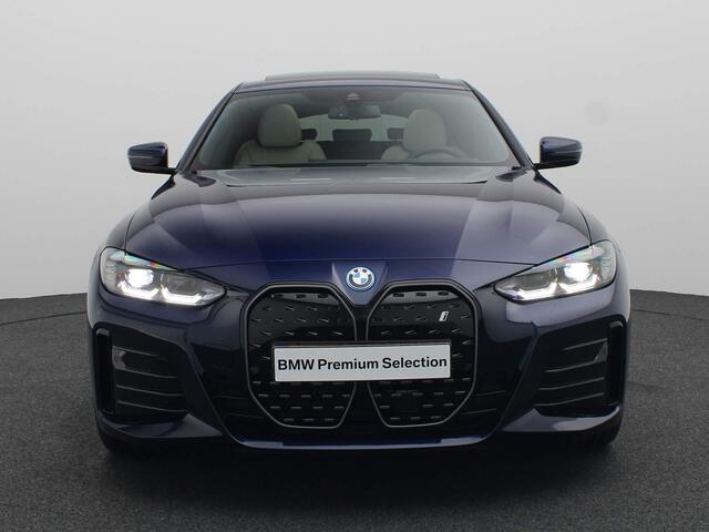 BMW i4 eDrive35 High Executive | M Sportpakket Pro | Safety Pack | Schuifdak | Active Cruise Control | Harman Kardon | 19''