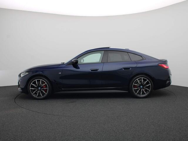 BMW i4 eDrive35 High Executive | M Sportpakket Pro | Safety Pack | Schuifdak | Active Cruise Control | Harman Kardon | 19''