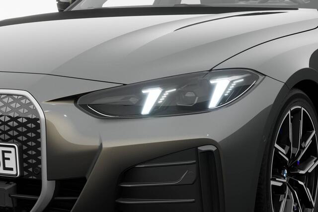 BMW i4 eDrive40 84 kWh | M Sportpakket | Extra getint glas in achterportierruiten en achterruit