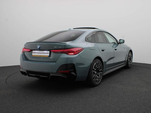 BMW i4 eDrive35 M SportPakket Pro | Innovation Pack | Comfort Pack | Comfort Access | Schuifdak | Elektrisch Verstelbare Stoelen | Driving Assistant Professional | Harman Kardon | 19''