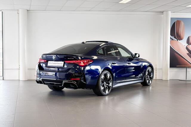 BMW i4 eDrive40 84 kWh | M Sport | Glazen Panoramadak | Harman Kardon | Stoelverwarming | Trekhaak |