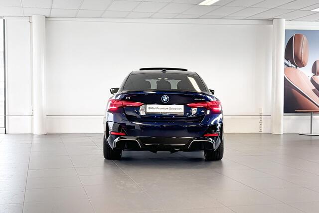 BMW i4 eDrive40 84 kWh | M Sport | Glazen Panoramadak | Harman Kardon | Stoelverwarming | Trekhaak |