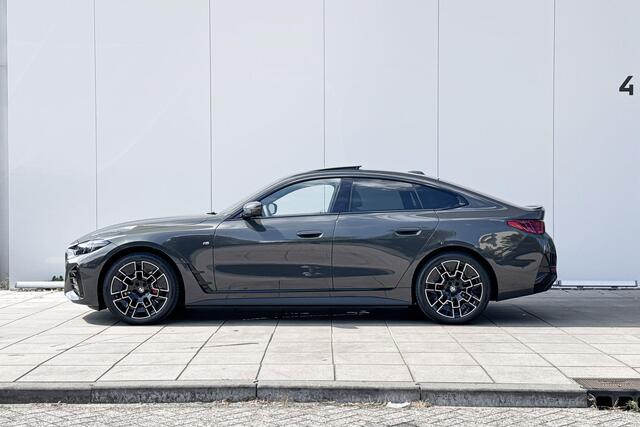BMW i4 eDrive35 M-Sport / Stoelverwarming / Getinte Ramen / Parking Assistant Plus / Driving Assistant / Head Up Display