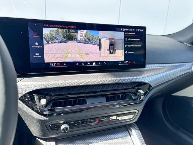 BMW i4 eDrive35 M-Sport / Stoelverwarming / Getinte Ramen / Parking Assistant Plus / Driving Assistant / Head Up Display