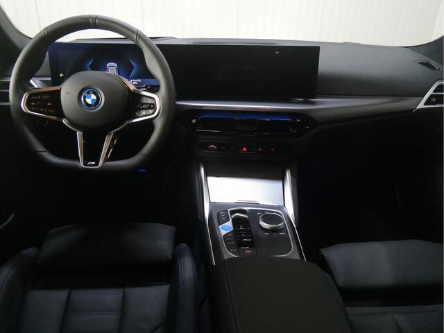 BMW i4 eDrive35 M Sport / Schuif-kanteldak / M Sportstoelen / Adaptieve LED / Parking Assistant Plus / Comfort Access / Stoelverwarming