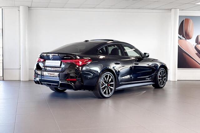 BMW i4 eDrive40 | M Sport | Stoelverwarming | Glazen Schuif-/kanteldak | Achteruitrijcamera |
