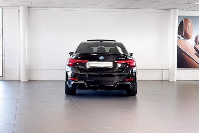 BMW i4 eDrive40 | M Sport | Stoelverwarming | Glazen Schuif-/kanteldak | Achteruitrijcamera |
