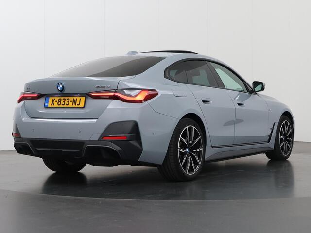 BMW i4 eDrive40 84 kWh M-Sport | Schuif/Kanteldak | Trekhaak Ele.wegklapbaar | Sportstoelen | LED | Ele.kofferdeksel | Adaptieve Cruise Control | Navigatie | Camera |