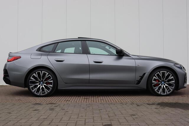 BMW i4 M50 High Executive Model M Sport / Harman Kardon / Schuif-Kanteldak / 20" LMV / M-Sportstoelen / Co-Pilot Pack / Stoelverwarming / Stuurwielrandverwarming
