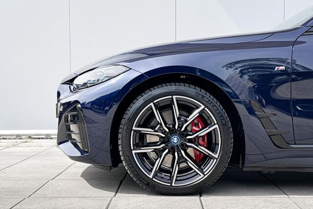 BMW i4 M50 High Executive Stuurwielrand Verwarming/ Stoelverwarming / Adaptief Onderstel / Comfort Acces / Shadow Line Koplampen / Glazen Schuifdak / Getinte Ramen / Dimmende Binnen & Buitenspiegel / Electrisch Verstelbare Voorstoelen / Driving Assistant Prof /