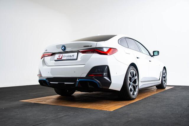 BMW i4 eDrive40 High Executive 84 kWh M Sport - Trekhaak - Parking/Driving Assistant - Comfort Access - Harman Kardon - Elektrisch verwarmde stoelen - Stuurwielrand verwarmd - Getinte Ruiten - Adaptief M Onderstel -