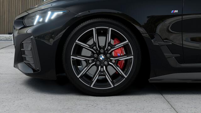 BMW i4 eDrive40 Gran Coupé M Sport / Schuif-kanteldak / Active Cruise Control / Achteruitrijcamera / Parking Assistant / Comfort Access / Adaptieve LED