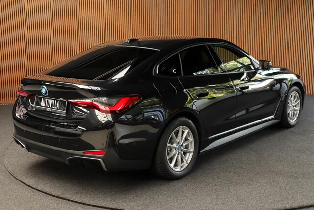 BMW i4 eDrive40 84 kWh M-pakket Navi Leer Elektr. achterklep 360° Camera Co-pilot Climate voor & achter Zwarte hemelbekleding PDC LM velgen BTW auto