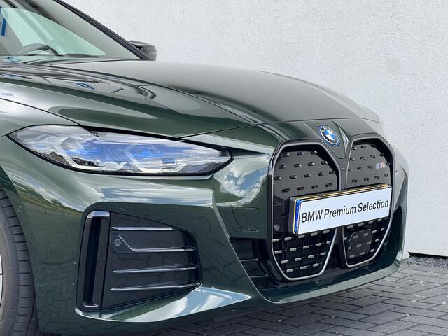 BMW i4 M50 High Executive 84 kWh Sport Pro | High Executive | Glazen schuif-/kanteldak | Stuur- en stoelverwarming | Trekhaak | Comfort Access | Laserlight | Harman Kardon | Head-Up