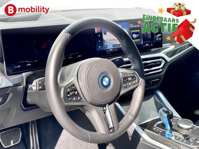 BMW i4 M50 544Pk High Executive 84 kWh Elektrisch verstelbare stoelen | Trekhaak 1600kg | Schuif/Kanteldak | Driving Assistant Professional | Harman Kardon Sound System | Head Up Display | Verwarmbaar stuurwiel | Interieurlijsten Carbon Fibre | Parking Assist.