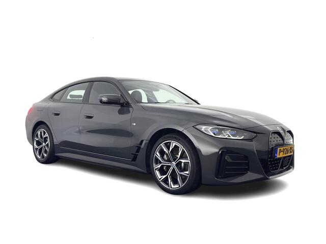 BMW i4 eDrive40 High Executive 84 kWh (3-Fase) [SOH-97%] (INCL-BTW) *AUT | HEAD UP | FULL-LED | HARMAN KARDON | ADAPTIVE-CRUISE | WIDE-SCREEN-DIGI-COCKPIT | DAB+ | CAMERA | AMBIENT-LIGHT | CARPLAY | LEATHER SPORT-SEATS | | 19''ALU*