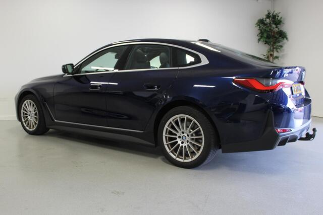 BMW i4 eDrive40 High Executive 84 kWh | SCHUIF/-KANTELDAK | CARPLAY | DAB | NAVIGATIE | HARMAN/KARDON | CAM |