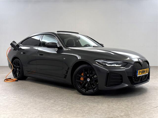 BMW i4 eDrive40 84 kWh M-Sport | SOH 94% | Snelladen | Pano | BMW Laser | Widescreen | Virtual | Adap. Cruise | Sfeer | Carplay | Camera | Stoelverw.