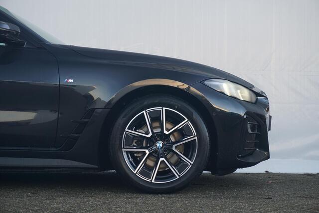 BMW i4 eDrive40 M Sportpakket 18'' / Head-Up Display / Parking Assistant Plus / Schuif-/kanteldak / Trekhaak