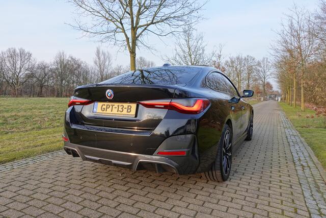 BMW i4 eDrive35 High Executive 70 kWh | Harman Kardon | Head-Up | LED | Schuif/Kanteldak | Adaptive Cruise | Leder |