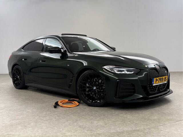 BMW i4 eDrive40 84 kWh M-Sport | M-Performance kit | Pano | 20''LMV | Widescreen | BMW-LED | Snelladen | SOH 92% | Camera | Sfeer | Virtual | Trekh. | Carplay