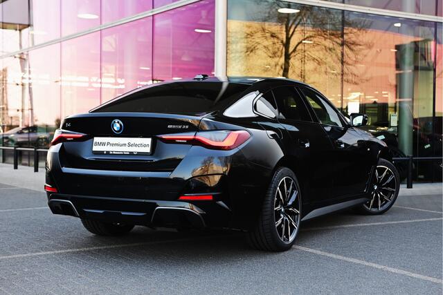 BMW i4 eDrive35 Gran Coupé M Sport / Active Cruise Control / Comfort Access / Parking Assistant / Stoelverwarming / Widescreen Display / Live Cockpit Plus