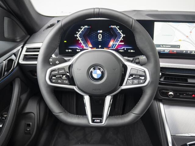BMW i4 eDrive35 | M Sportpakket | Comfort Pack | Stuurwielrand verwarmd | Comfort Access | Achteruitrijcamera | Schuif-/kanteldak | Stoelverwarming