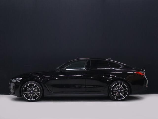 BMW i4 eDrive40 84 kWh [SCHUIFKANTELDAK, ADAPTIVE CRUISE CONTROL, APPLE CARPLAY, ANDROID AUTO, ACHTERUITRIJCAMERA, PDC V+A,STUURVERWARMING, BMW LED, NIEUWSTAAT]