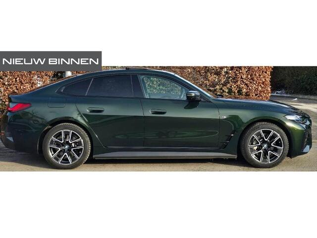 BMW i4 eDrive35 High Executive 70 kWh M Sport | Harman Kardon | Panoramadak | Stuurverwarming | Stoelverwarming | Head-Up Display | Adaptive Cruise Control | Keyless | Memory Seats | Laser Lights | Trekhaak | 360 Camera