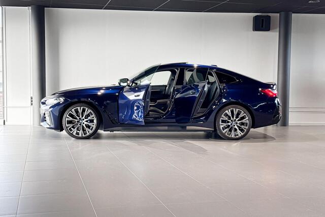 BMW i4 M50 High Executive 84 kWh | Glazen schuif-/kanteldak | Comfort Access | Stoelverwarming | Head-Up Display |