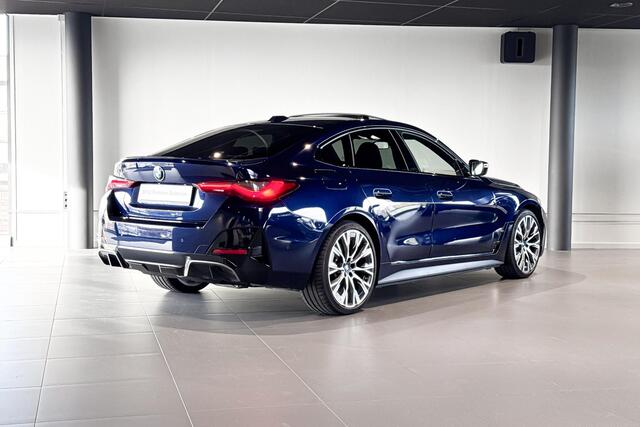 BMW i4 M50 High Executive 84 kWh | Glazen schuif-/kanteldak | Comfort Access | Stoelverwarming | Head-Up Display |