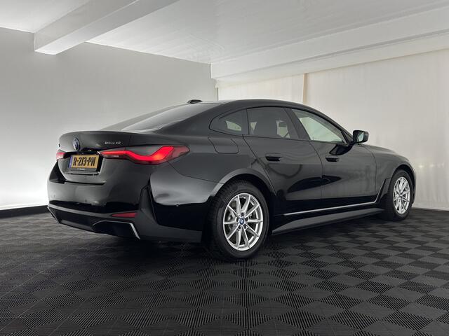 BMW i4 eDrive40 High Executive 84 kWh [ 3-Fase ] {SOH-95%} (INCL.BTW) *HEAD-UP | LEATHER | FULL-LED | WIDESCREEEN-DIGI-COCKPIT | CAMERA | KEYLESS | HIFI-SOUND | PRIVACY-GLASS | ECC | PDC | CRUISE | 17''ALU*