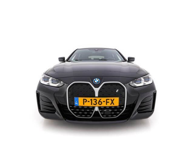 BMW i4 eDrive40 High Executive 84 kWh M-Sportpack [ 3-Fase ] {SOH-93%} (INCL.BTW) Aut *LEATHER | HEAD UP | FULL-LED | HIFI-SOUND | CRUISE | WIDESCREEN-COCKPIT | DAB+ | CAMERA | AMBIENTLIGHT | CARPLAY | HEATED-SPORTSEATS | PRIVACY-GLASS | 19''ALU*