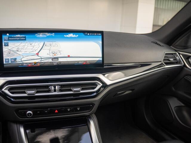 BMW i4 eDrive40 | M Sport | Stoelverwarming | Schuif-/kanteldak | Active Cruise Control | Parking Assistant Plus | 19''