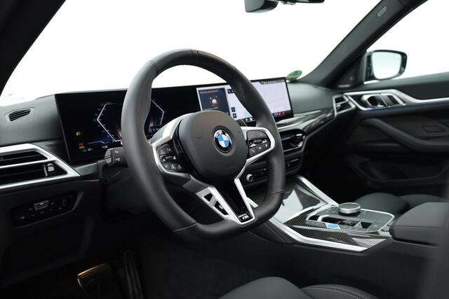 BMW i4 eDrive40 M Sport Pro 84 kWh | S/K-Dak | Elek. Trekhaak | Shadowline | Widescreen | Innovation pack | HUD | 360*+PDC | Carbon | Driving Ass. pro | Memory | Dodehoek V