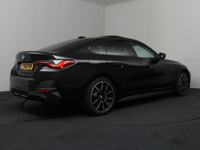 BMW i4 High Executive M-Sport | SoH 95,3% | ACC | Trekhaak | Elektrisch Panoramadak!