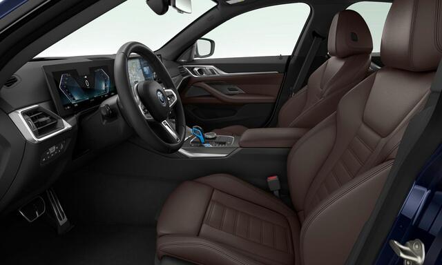 BMW i4 eDrive40 84 kWh M Sport pro - Active cruise control - Elektrisch verwarmde voorstoelen - Stuurwielrand verwarmd - Getinte ruiten - Comfort Access - Harman kardon - Ambiance verlichting -