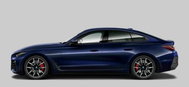 BMW i4 eDrive40 84 kWh M Sport pro - Active cruise control - Elektrisch verwarmde voorstoelen - Stuurwielrand verwarmd - Getinte ruiten - Comfort Access - Harman kardon - Ambiance verlichting -