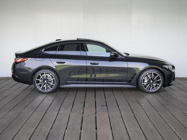 BMW i4 xDrive40 High Executive | M Sportpakket | Glazen schuif-/kanteldak | Trekhaak | Showroom Selection