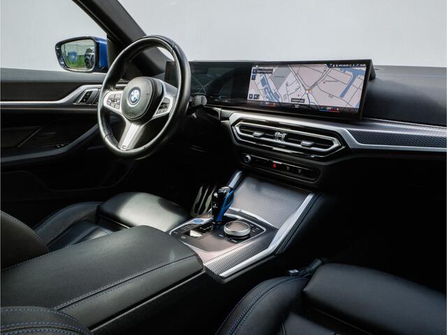 BMW i4 eDrive40 High Executive 84 kWh M-Sport/ Sportstoelen/ Trekhaak/ Stoelverwarming/ Head-up/ Camera