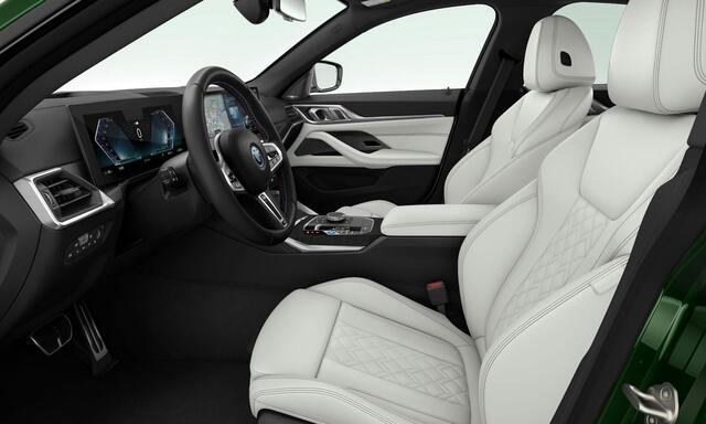 BMW i4 M50 High Executive 84 kWh Trekhaak - Panoramadak - Driving Assistant Professional - Harman Kardon - Stuurwielrand verwarmd - Parking Assistant Plus - BMW Laserlight - Elektrisch verstelbare/verwarmde stoelen -