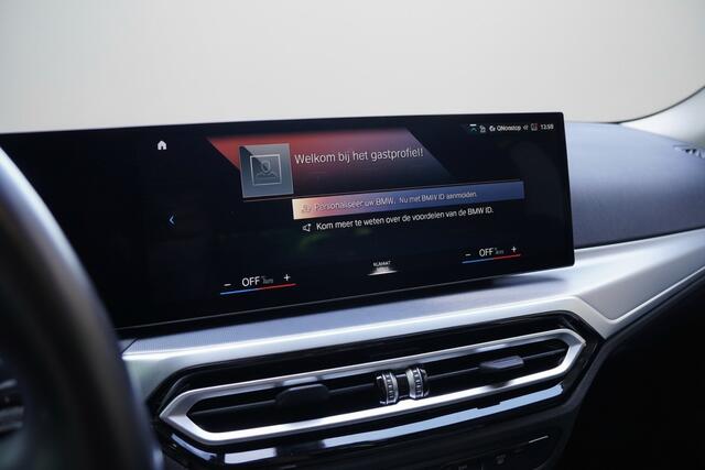 BMW i4 eDrive40 High Executive 84 kWh Driving assistant / BTW / Sportstoel verwarming