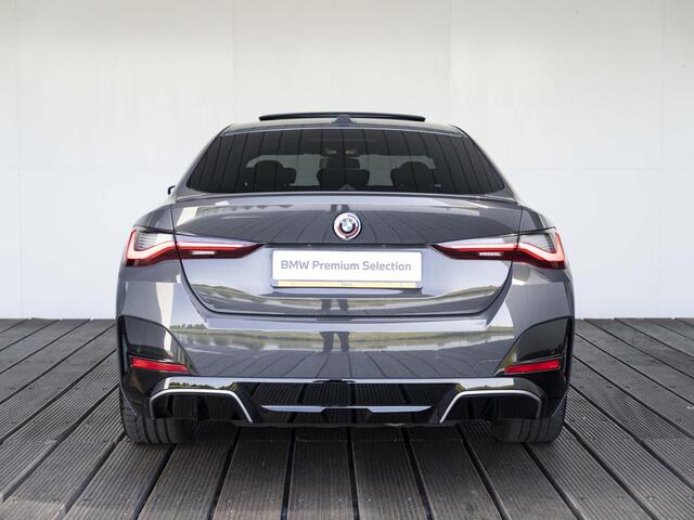 BMW i4 Gran Coupé M50 | M Sportpakket | High Executive | Stuurwielrand verwarmd | Adaptief M Onderstel | Glazen schuif-/kanteldak | Driving Assistant Professional | Trekhaak