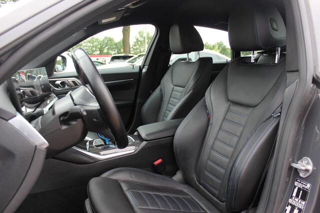 BMW i4 M50 High Executive 84 kWh / 360Camera / Head-up / Leder / Harman Kardon / Carbon intr.+extr. / 19'' / CarPlay / Stoelverwarming / Dodehoek / DAB / Cruise Control Adaptief