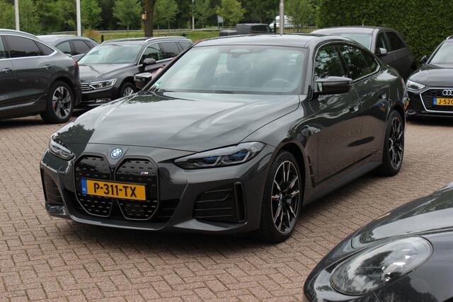 BMW i4 M50 High Executive 84 kWh / 360Camera / Head-up / Leder / Harman Kardon / Carbon intr.+extr. / 19'' / CarPlay / Stoelverwarming / Dodehoek / DAB / Cruise Control Adaptief